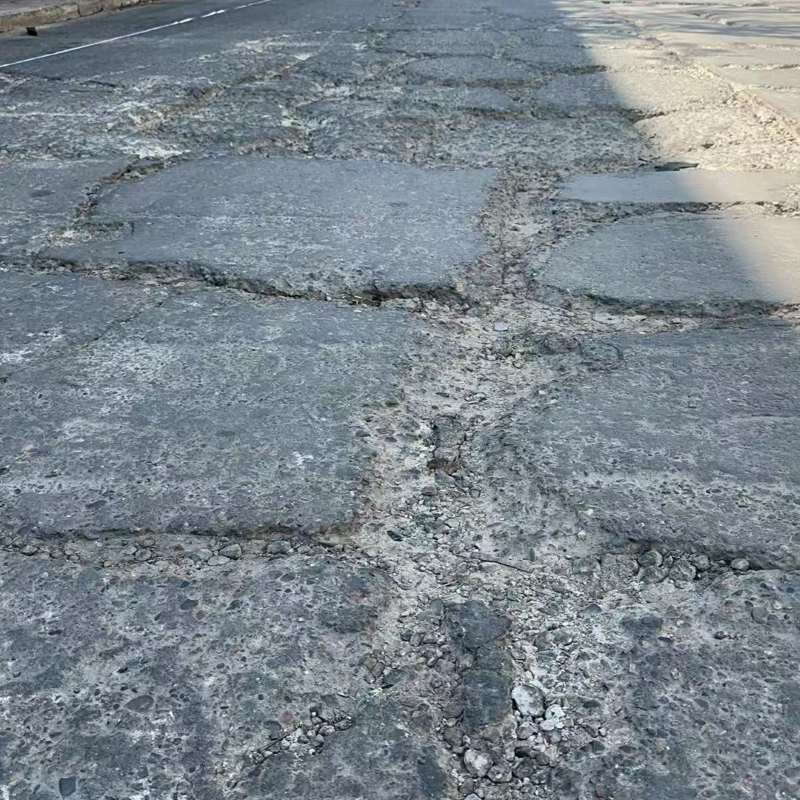 建华路面起砂露石子修补料